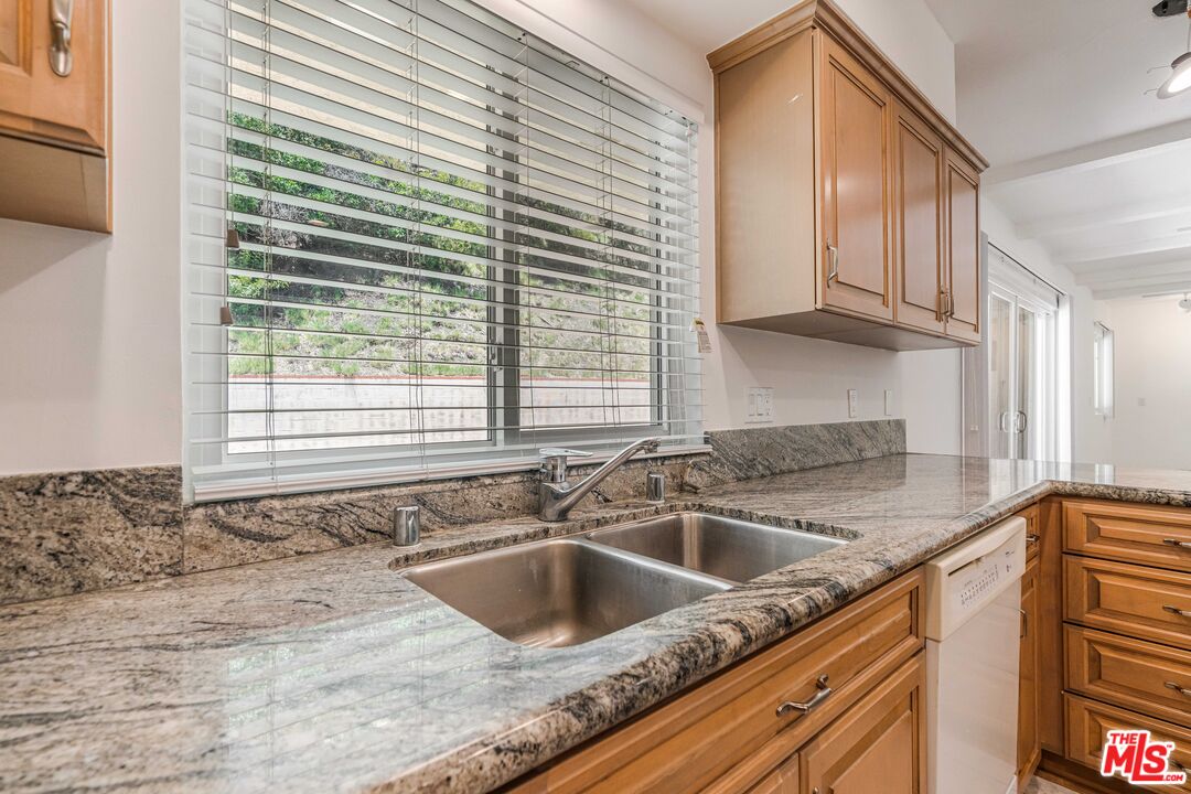 1181 Somera Road Los Angeles, CA 90077 - Photo 13 of 40 a kitchen with a sink and a window