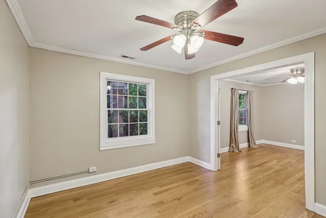 a bathroom with a granite countertop sink mirror and