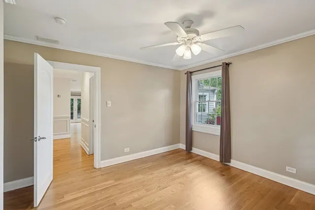 a spacious bathroom with a granite countertop sink mirror and double