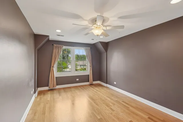 a view of a house with yard and a garden