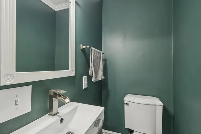 an aerial view of a house with a garden