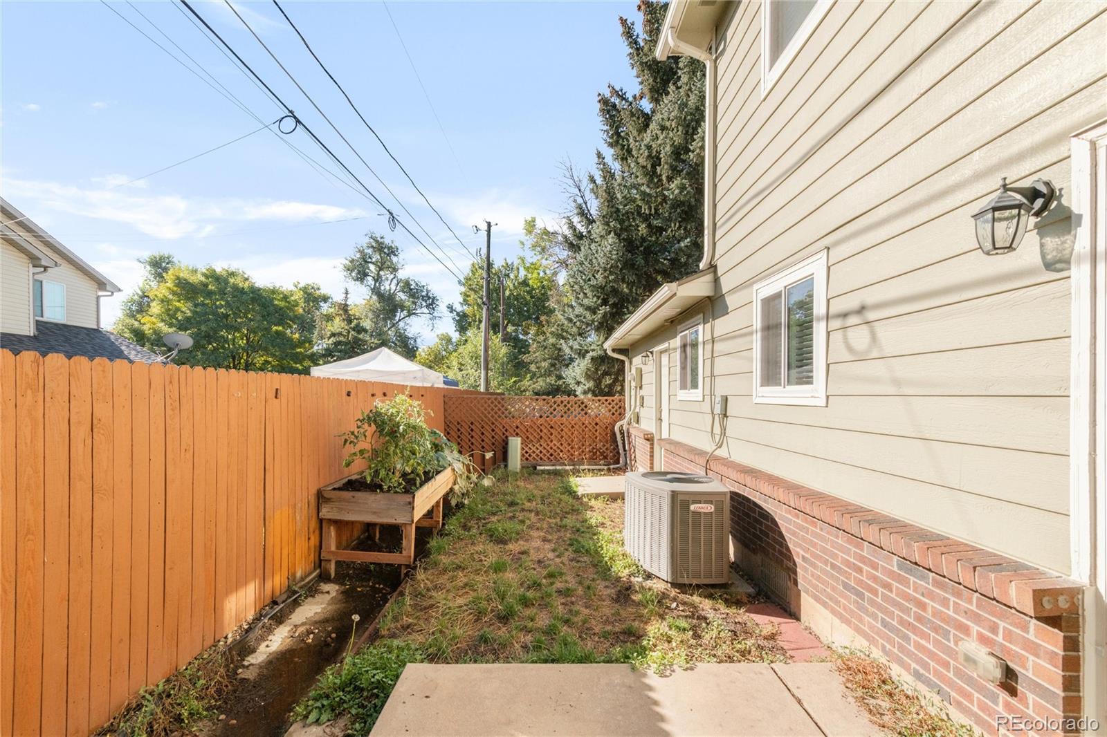5210 Estes Circle Arvada, CO 80002 - Photo 29 of 29 a view of a back yard of the house