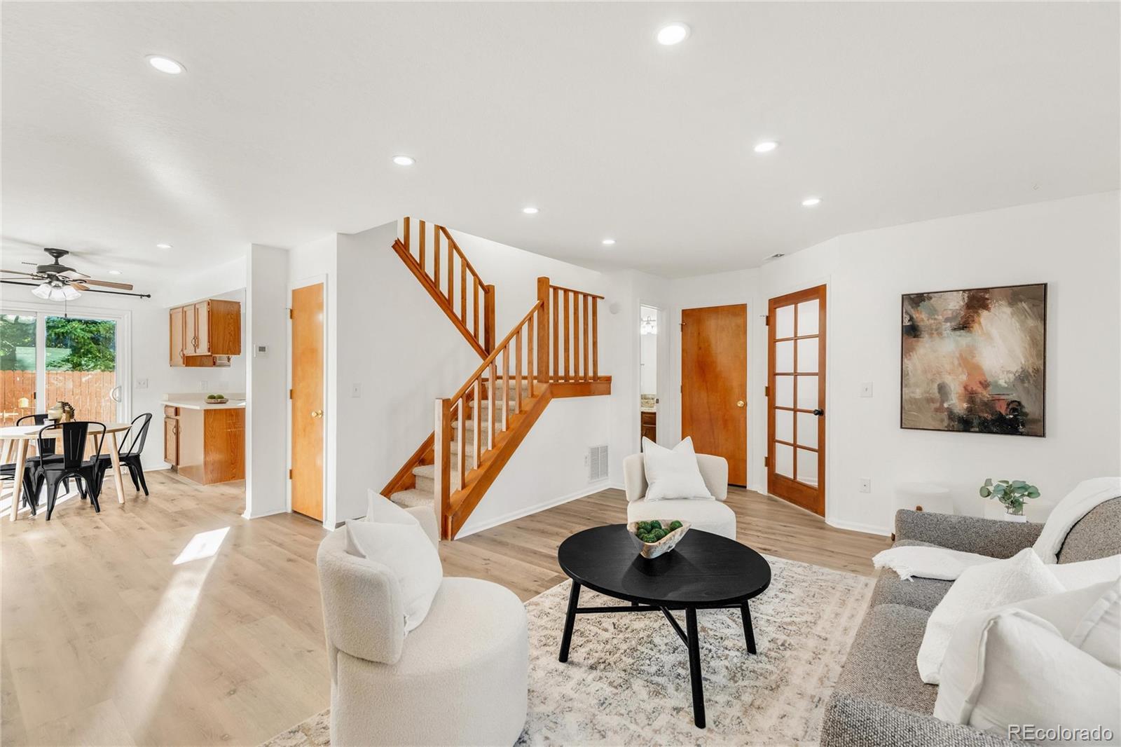 5210 Estes Circle Arvada, CO 80002 - Photo 5 of 29 a living room with furniture and a large window