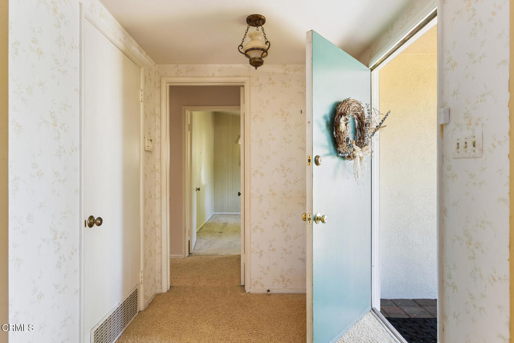 5029 Princess Anne Road La Canada Flintridge, CA 91011 - Photo 11 of 46 a view of a hallway with wooden floor and closet