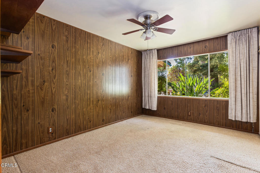 5029 Princess Anne Road La Canada Flintridge, CA 91011 - Photo 16 of 46 a view of a livingroom with a ceiling fan and window