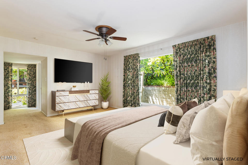 5029 Princess Anne Road La Canada Flintridge, CA 91011 - Photo 19 of 46 a bedroom with a bed tv and window