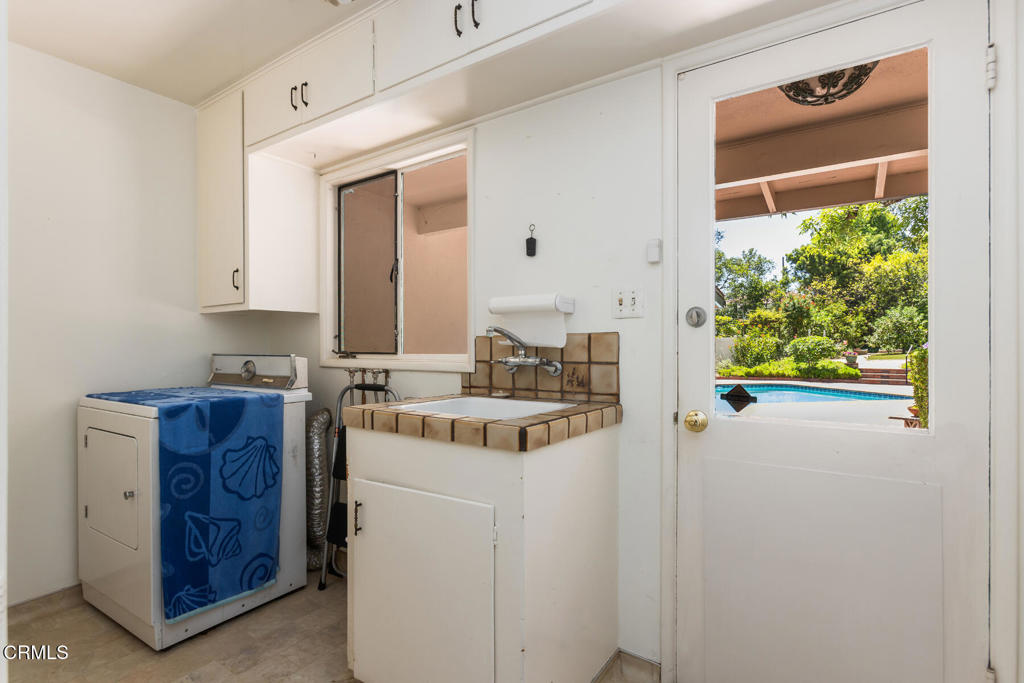 5029 Princess Anne Road La Canada Flintridge, CA 91011 - Photo 28 of 46 a room with a sink and a window