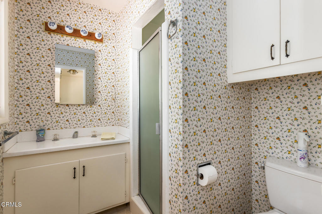 5029 Princess Anne Road La Canada Flintridge, CA 91011 - Photo 29 of 46 a bathroom with a sink a toilet and mirror