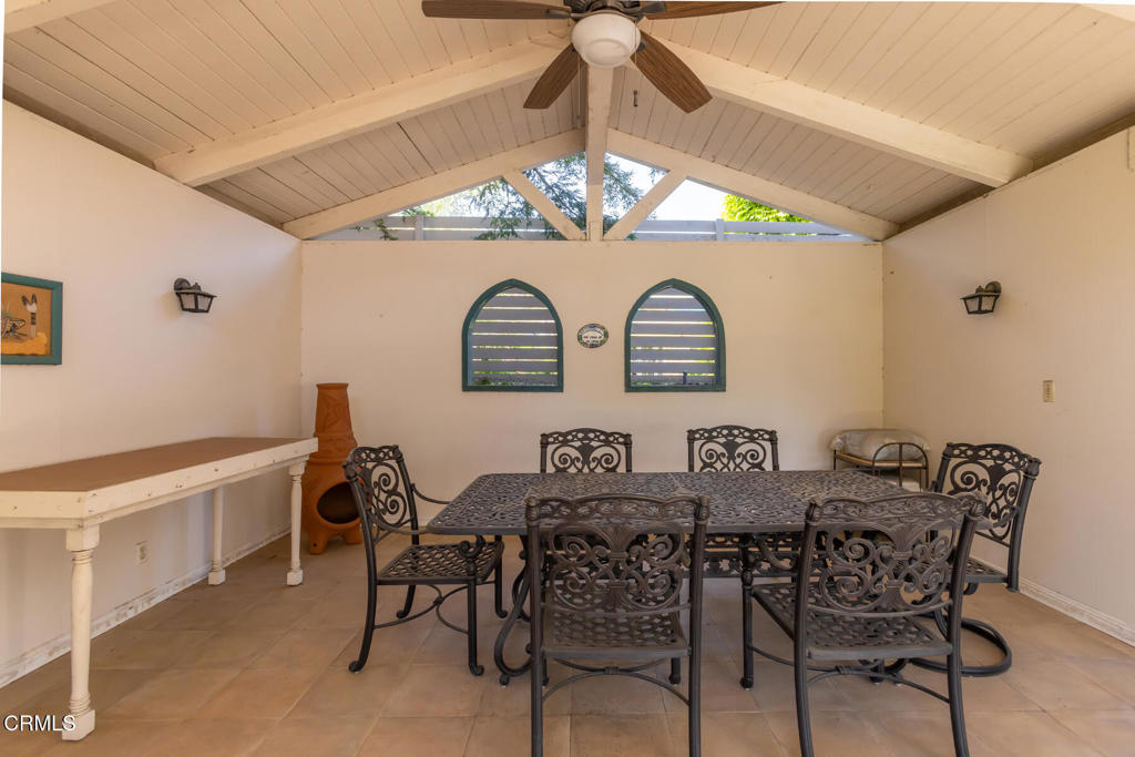 5029 Princess Anne Road La Canada Flintridge, CA 91011 - Photo 41 of 46 a view of a dining room with furniture and chandelier