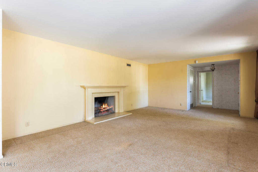 5029 Princess Anne Road La Canada Flintridge, CA 91011 - Photo 7 of 46 a view of an empty room with a fireplace