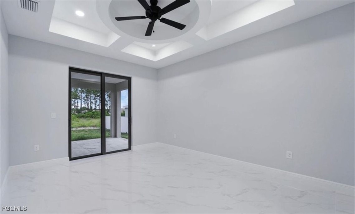 3208 3rd Street Southwest Lehigh Acres, FL 33976 - Photo 18 of 31 en empty room with window