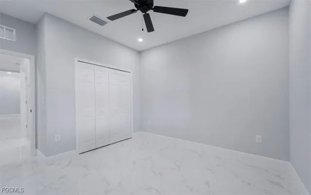 a view of a kitchen with a sink and chandelier