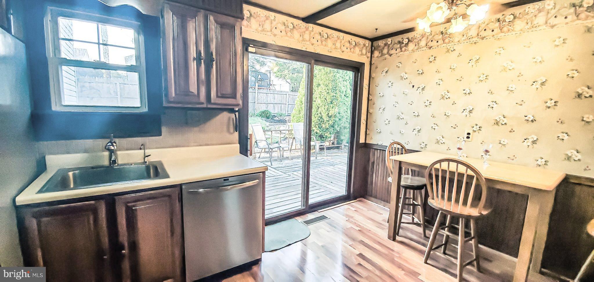 705 Auburn Road Fairless Hills, PA 19030 - Photo 14 of 39 Kitchen with View of Sliding Doors to Rear Yard