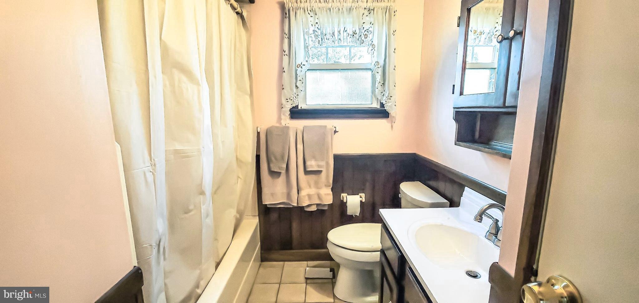 705 Auburn Road Fairless Hills, PA 19030 - Photo 34 of 39 Hall Bathroom View with Tub