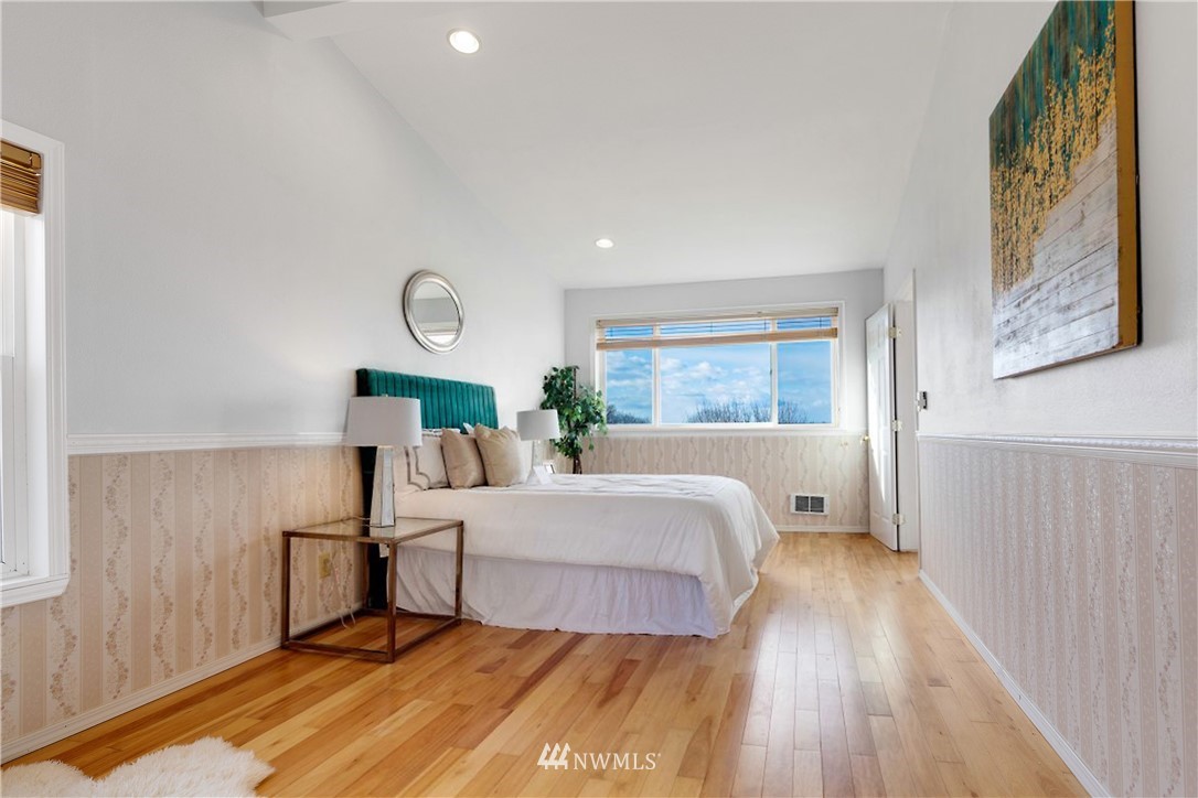 1433 South Hinds Street Seattle, WA 98144 - Photo 24 of 40 a bed room with a bed and a window