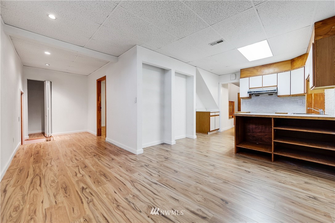 1433 South Hinds Street Seattle, WA 98144 - Photo 34 of 40 a view of room with wooden floor and window