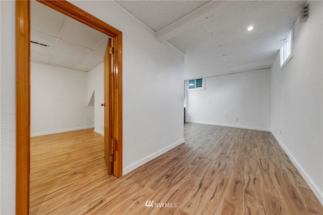 1433 South Hinds Street Seattle, WA 98144 - Photo 37 of 40 a view of hallway with wooden floor