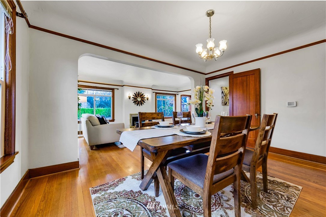 1433 South Hinds Street Seattle, WA 98144 - Photo 9 of 40 a view of a dining room with furniture window and wooden floor