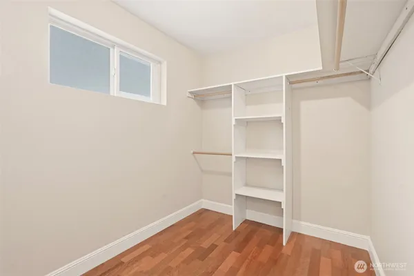 a view of an empty walk in closet