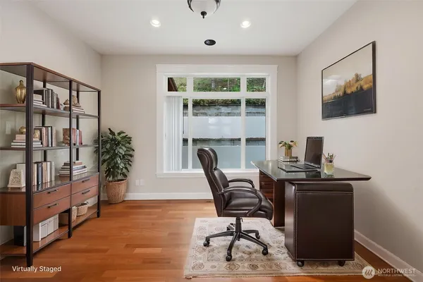 a workspace with furniture and window