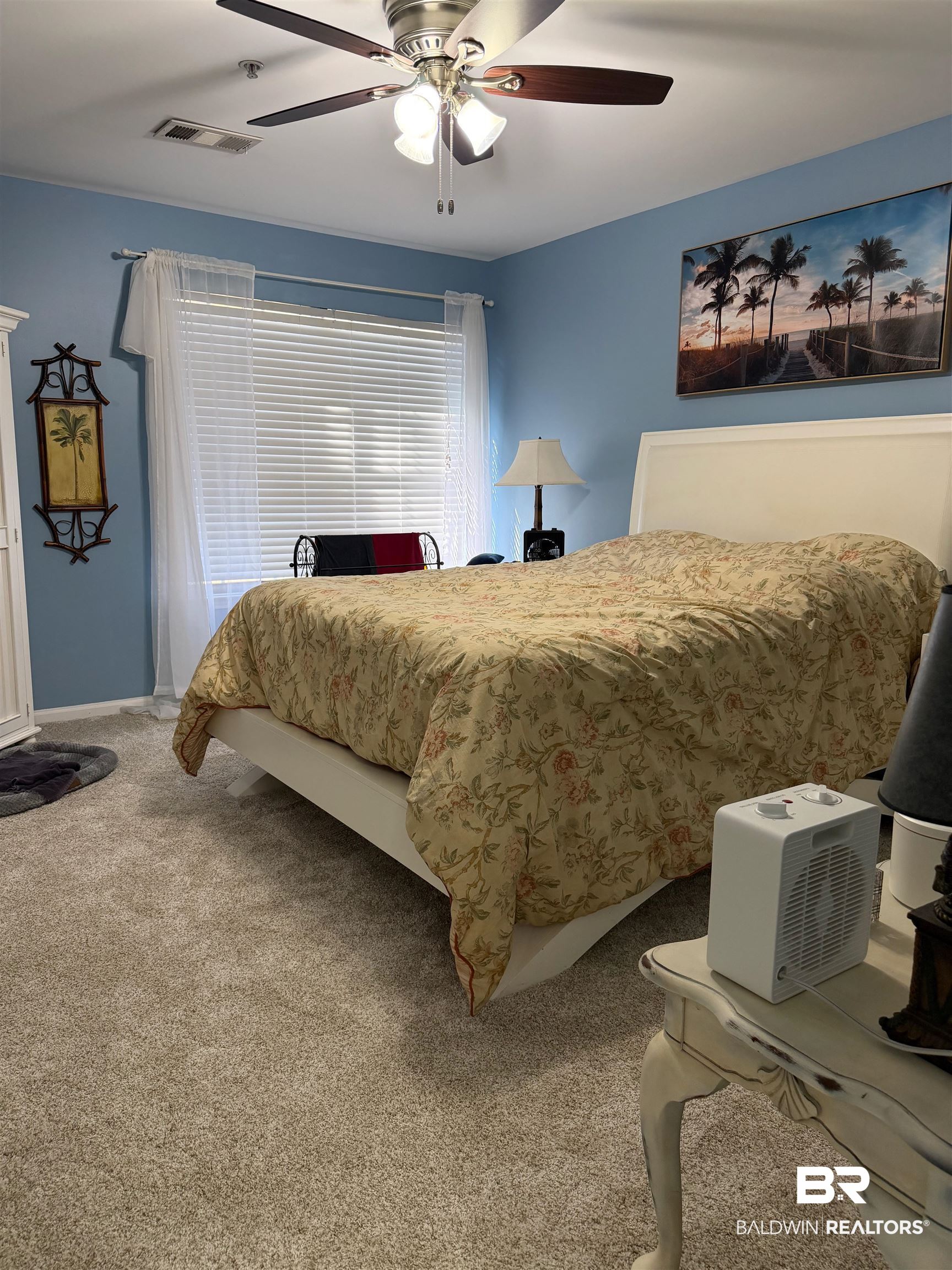 1517 Regency Road, Unit 71 Gulf Shores, AL 36542 - Photo 14 of 26 Bedroom with carpet flooring and a ceiling fan