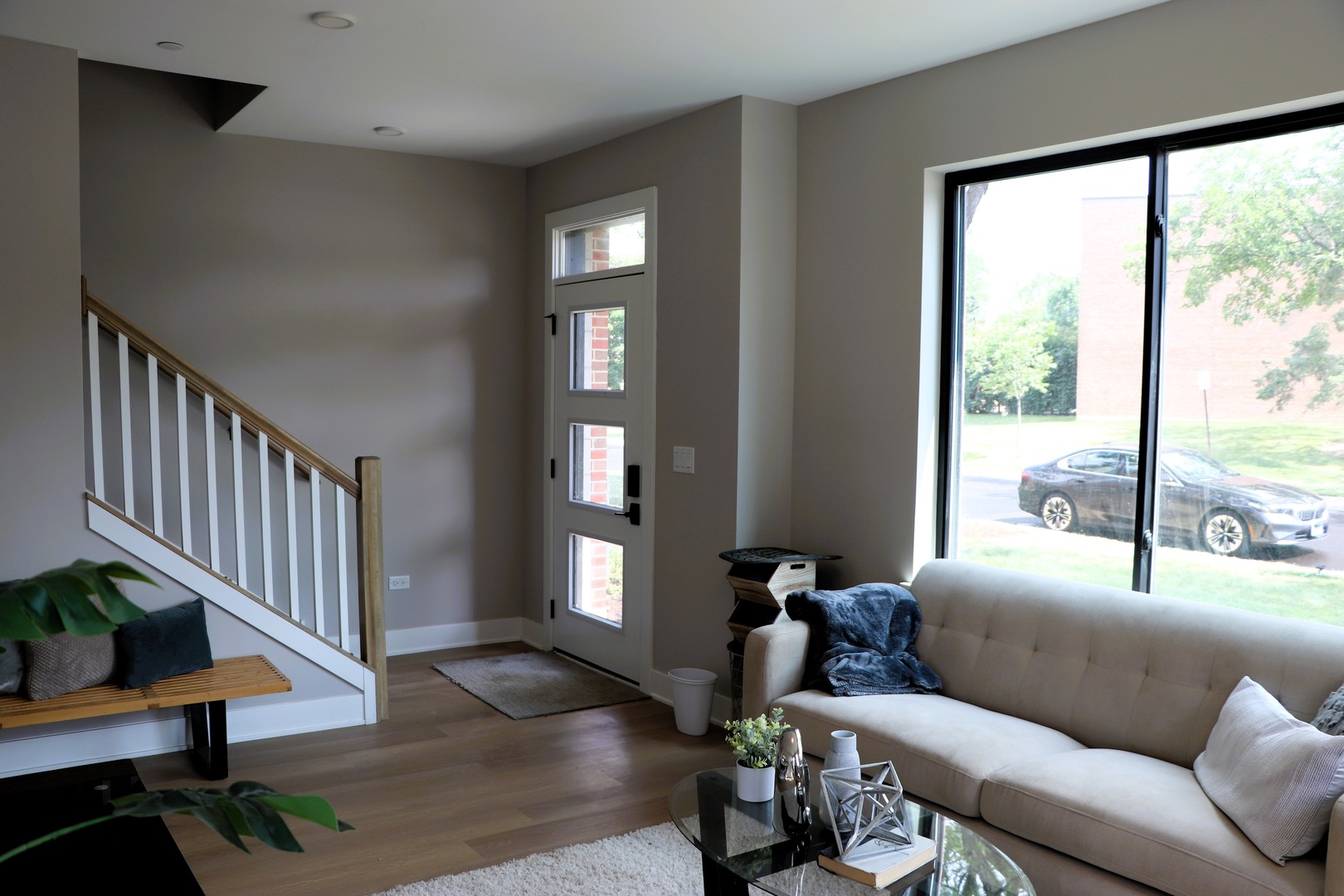 183 Pointe Drive, Unit 183 Northbrook, IL 60062 - Photo 11 of 15 a living room with furniture and wooden floor