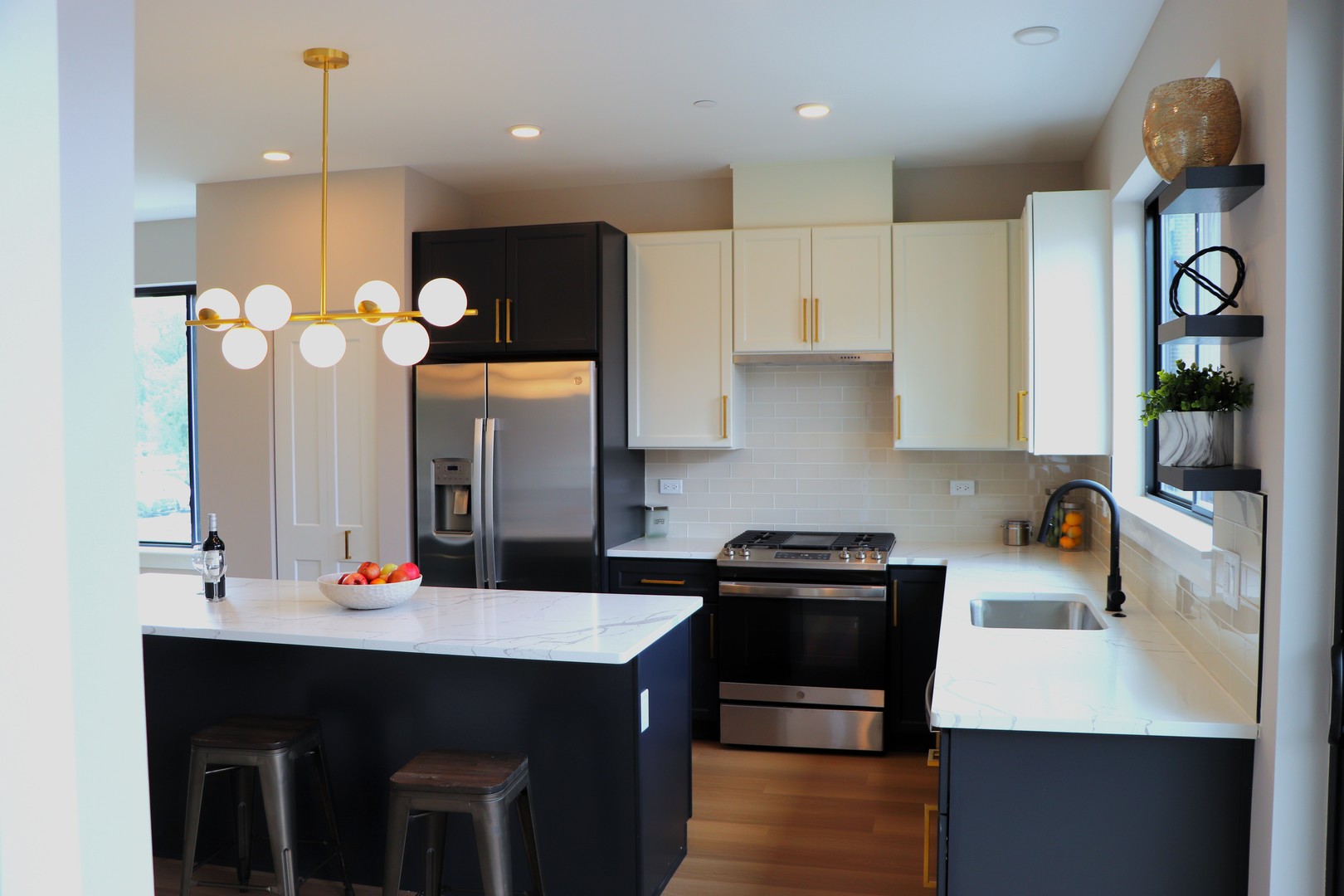 183 Pointe Drive, Unit 183 Northbrook, IL 60062 - Photo 12 of 15 a kitchen with a sink cabinets and window