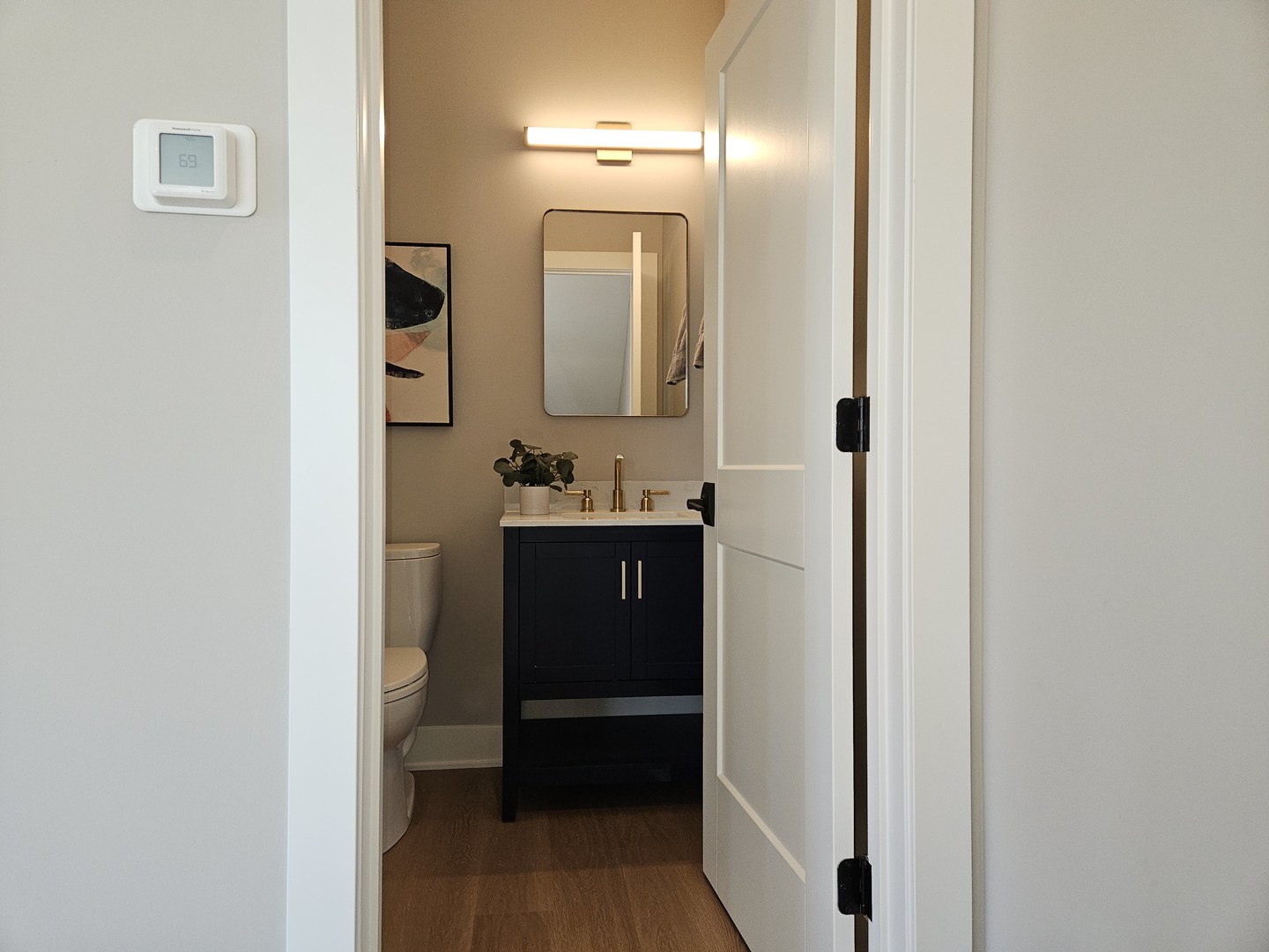 183 Pointe Drive, Unit 183 Northbrook, IL 60062 - Photo 13 of 15 a bathroom with a sink and a mirror