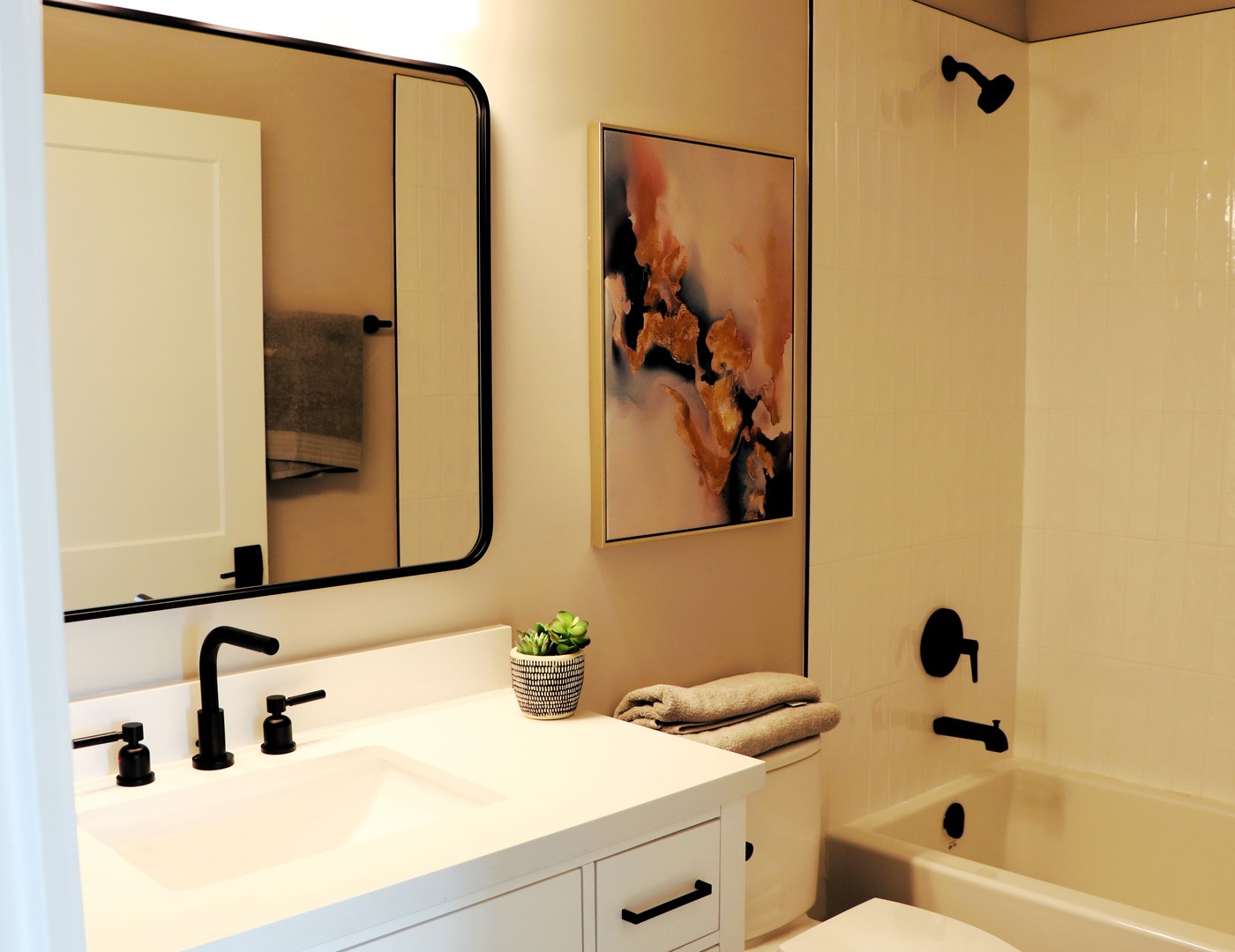 183 Pointe Drive, Unit 183 Northbrook, IL 60062 - Photo 10 of 15 a bathroom with a sink and a mirror