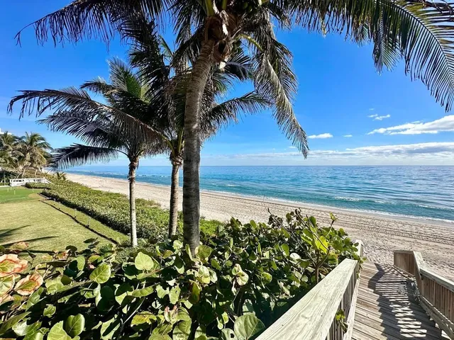 a view of a balcony with an ocean view