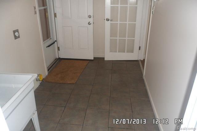 35293 Ash Road New Boston, MI 48164 - Photo 18 of 28 UTILITY ROOM LEADS TO ATTACHED GARAGE