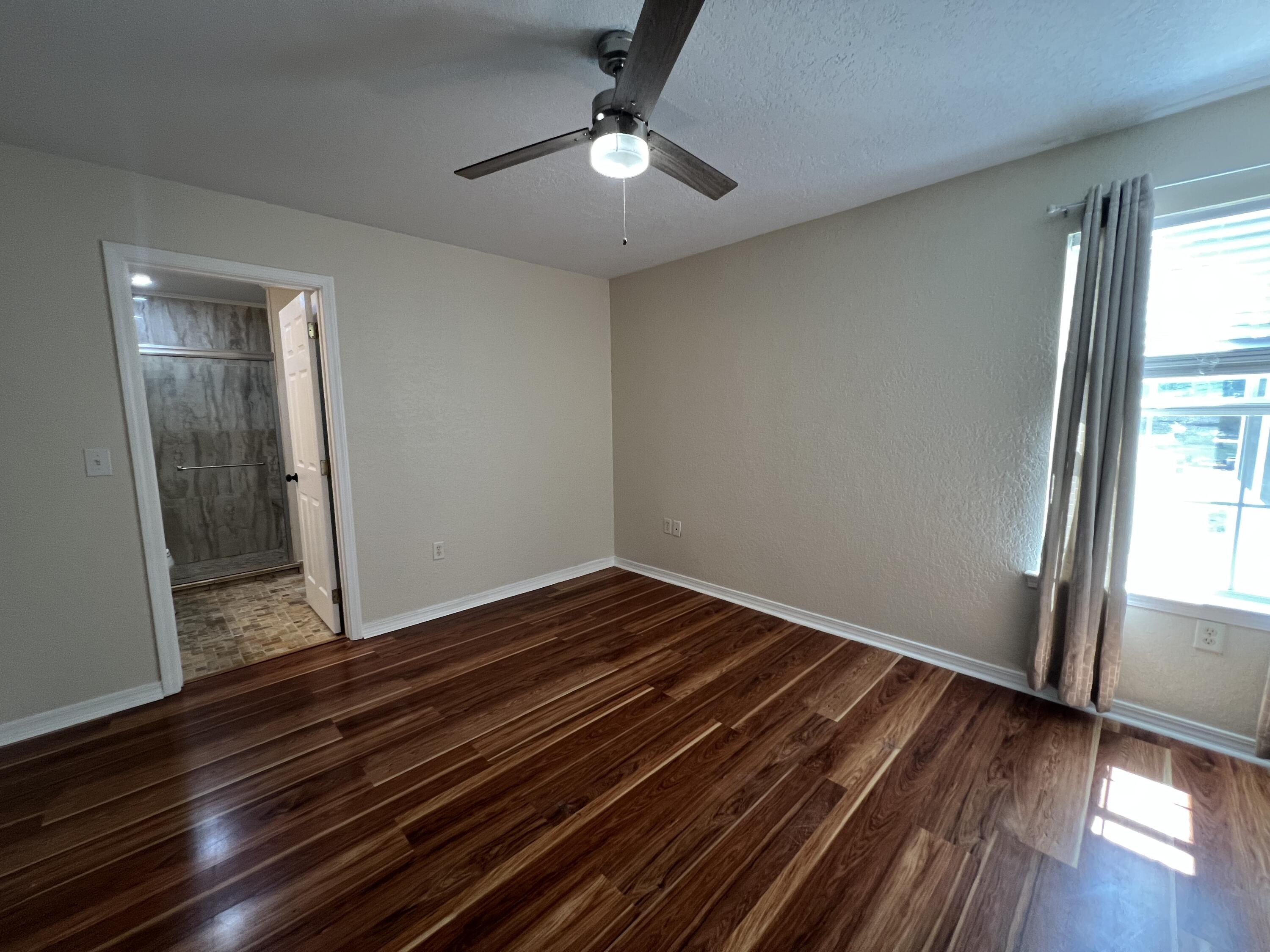 2864 Shoffner Avenue Crestview, FL 32539 - Photo 17 of 29 wooden floor in an empty room