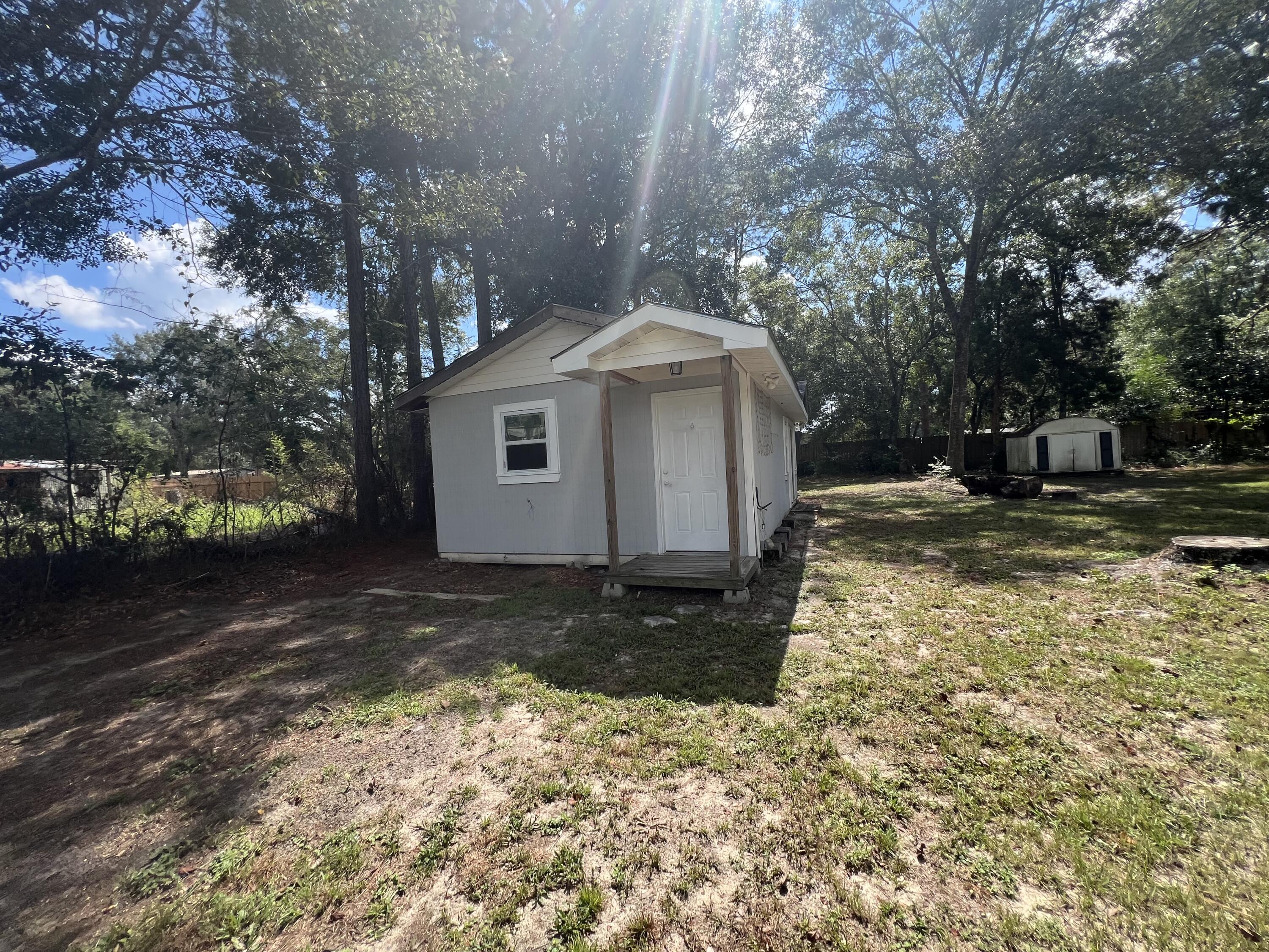 2864 Shoffner Avenue Crestview, FL 32539 - Photo 26 of 29 a view of a house with a yard