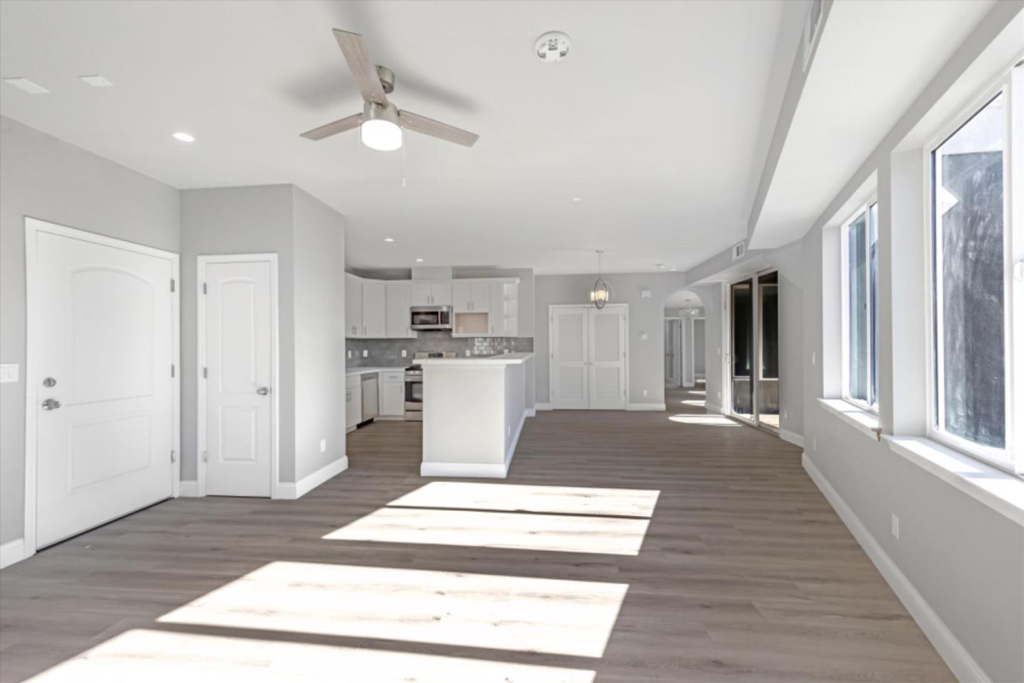 823 West A Street, Unit 2 Hayward, CA 94541 - Photo 2 of 8 a living room with furniture and a rug