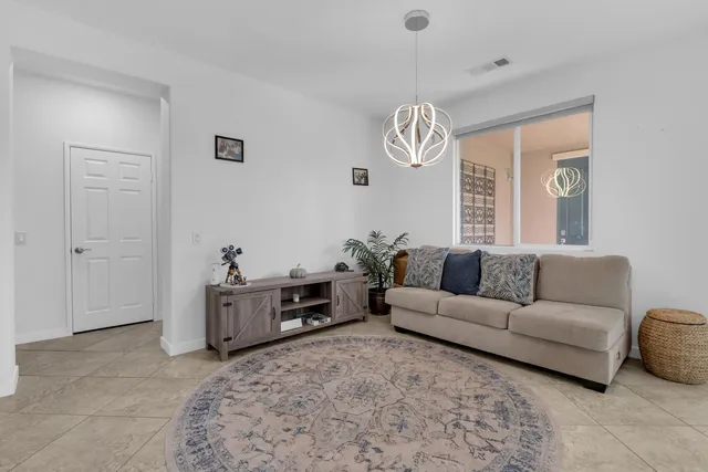 a kitchen with stainless steel appliances granite countertop a refrigerator and cabinets
