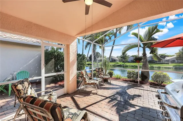 a view of a patio with couches chairs and a table