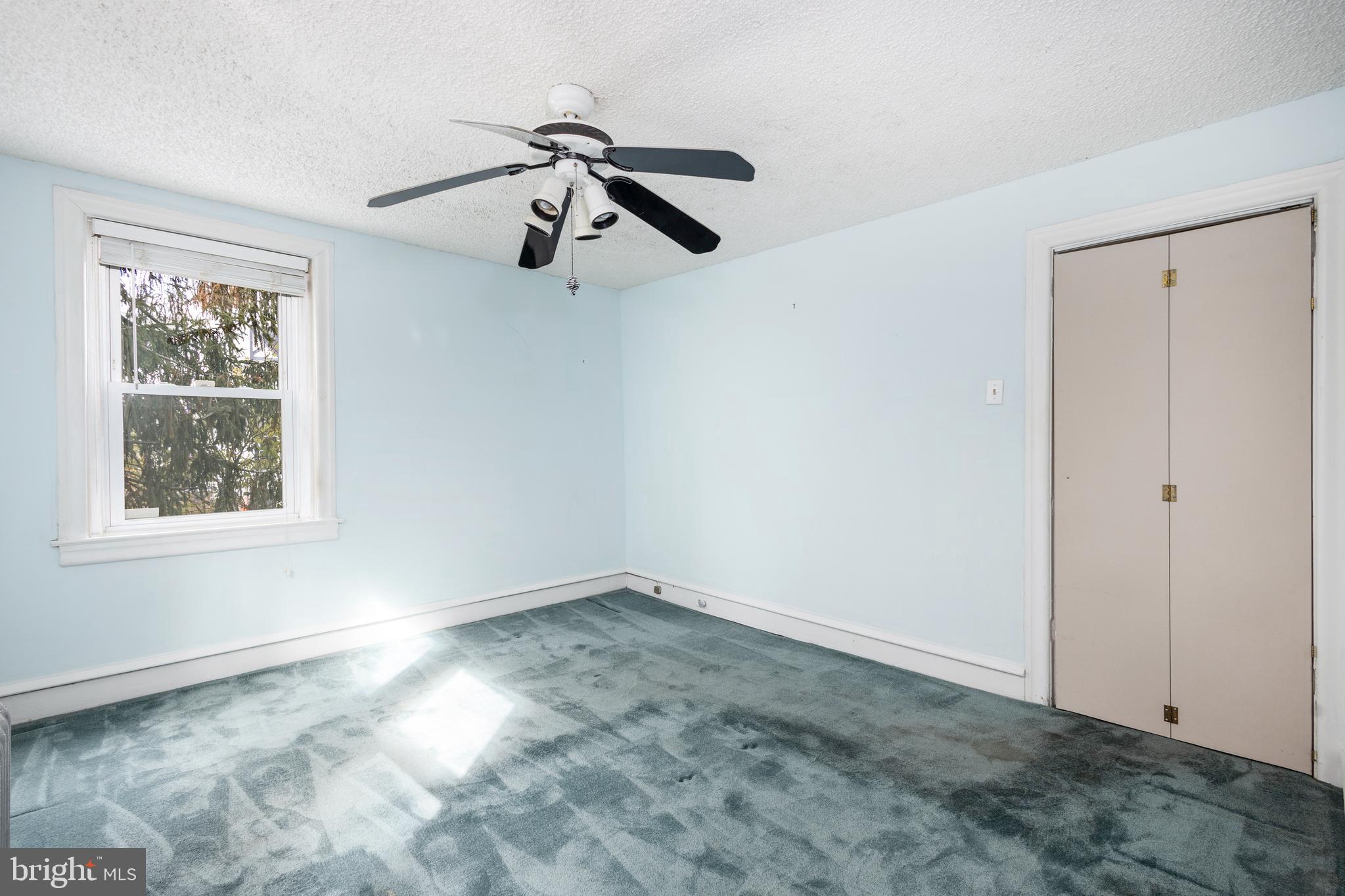 442 Wellesley Road Philadelphia, PA 19119 - Photo 11 of 18 a view of room with hardwood floor and window