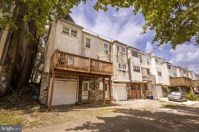 a front view of a building with street view