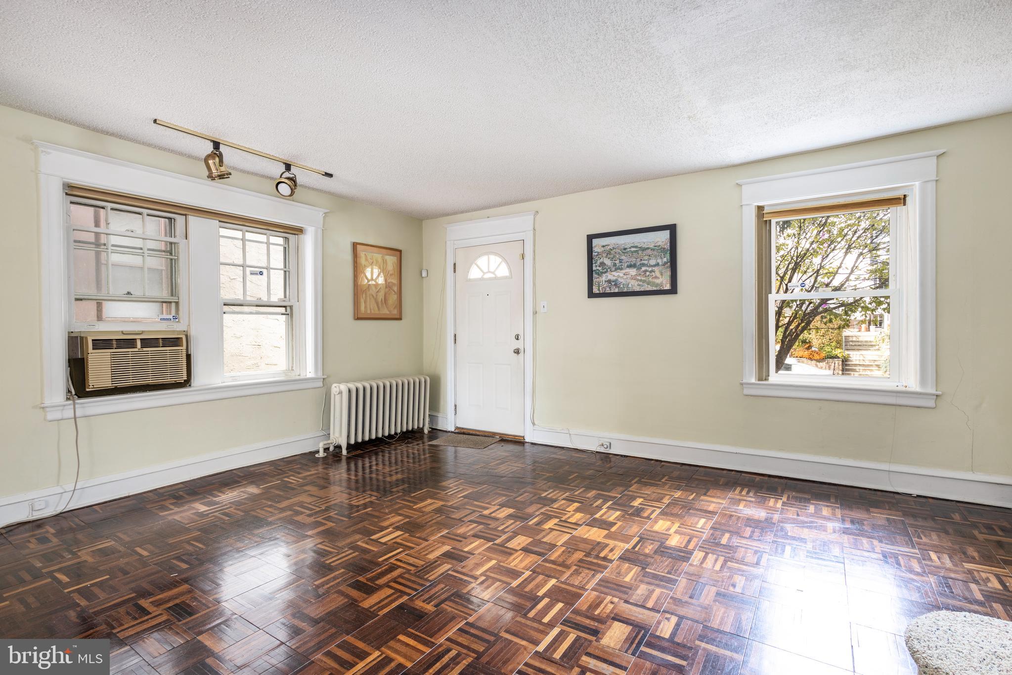 442 Wellesley Road Philadelphia, PA 19119 - Photo 3 of 18 a view of an empty room with a window