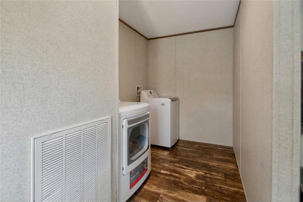 2857 Hickory Street Bunnell, FL 32110 - Photo 15 of 22 a utility room with dryer and washer