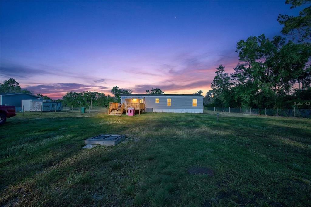 2857 Hickory Street Bunnell, FL 32110 - Photo 18 of 22 a front view of a house with a big yard