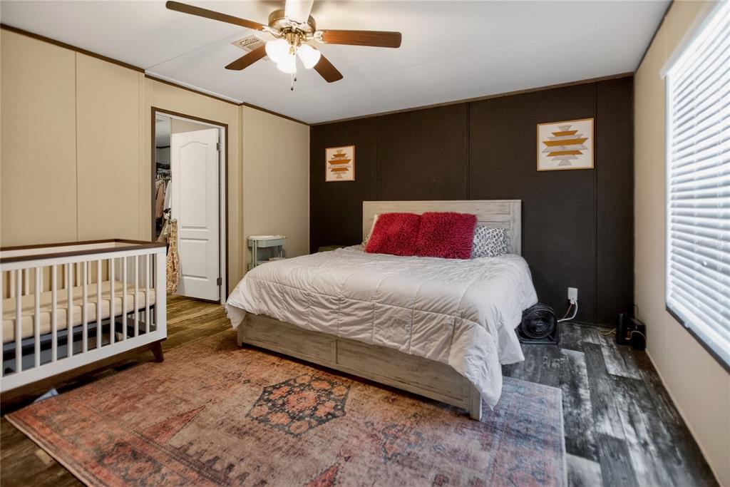 2857 Hickory Street Bunnell, FL 32110 - Photo 7 of 22 a bedroom with a bed and a window