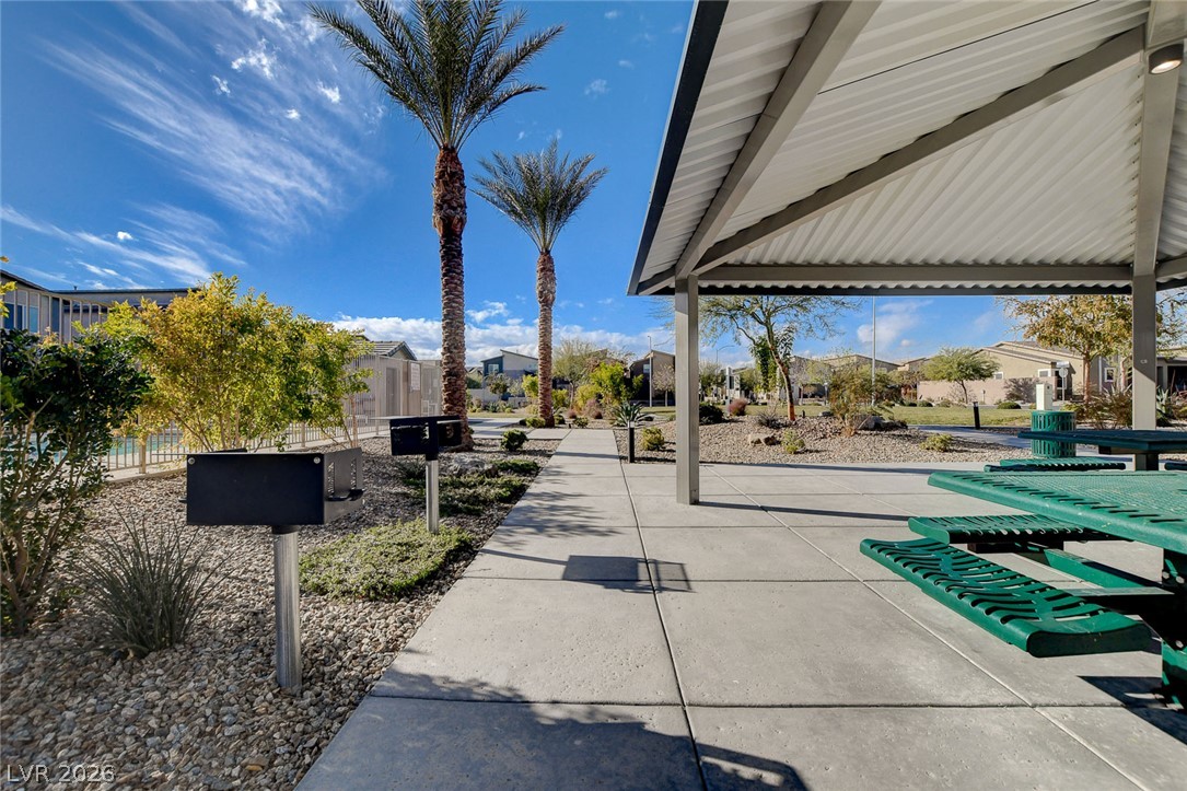 7330 North Decatur Boulevard, Unit 6 North Las Vegas, NV 89084 - Photo 24 of 42 Lush landscaping and paved walkways create an inviting community outdoor space.