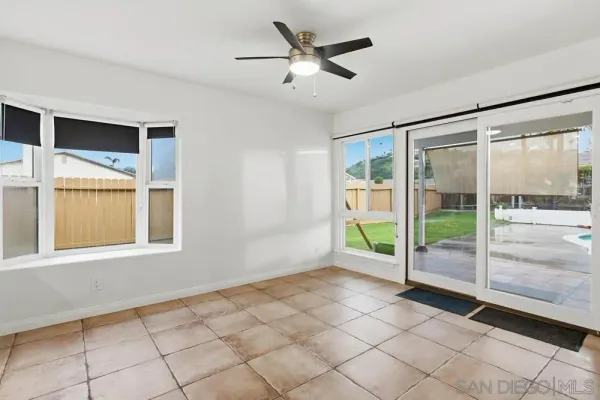 a view of an empty room and window