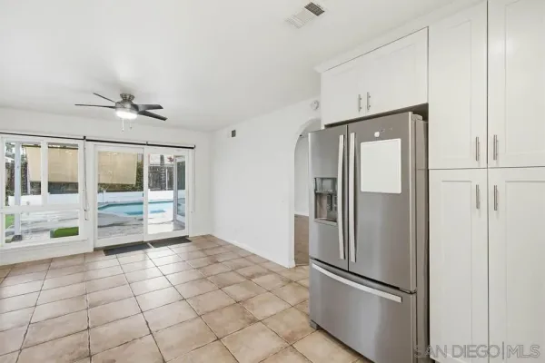 a kitchen with stainless steel appliances a stove and a refrigerator