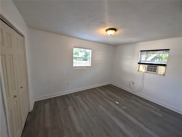 a view of an empty room and window