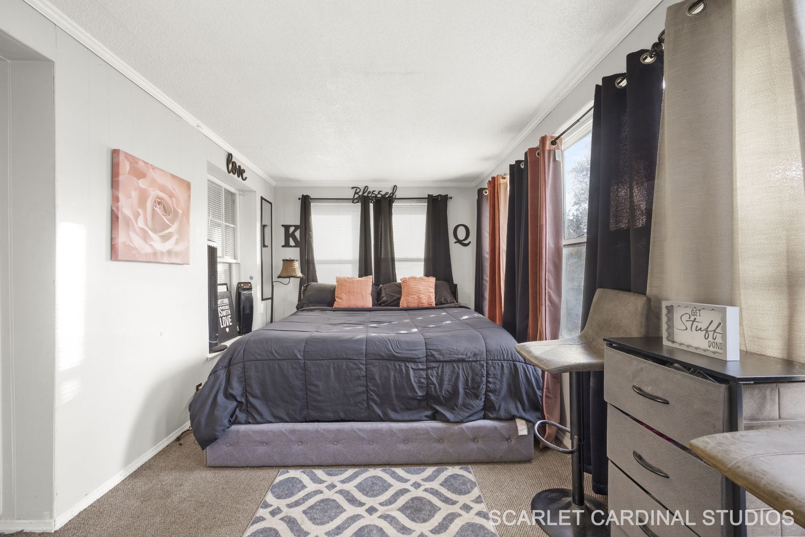 250 North Raynor Avenue Joliet, IL 60435 - Photo 5 of 17 a bedroom with a bed next to a window