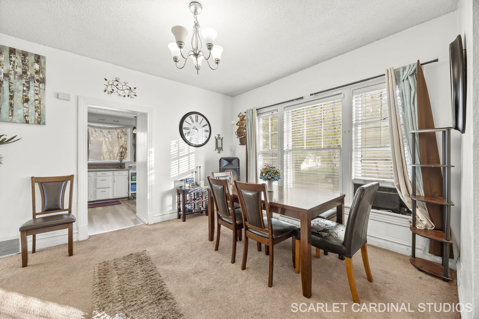 250 North Raynor Avenue Joliet, IL 60435 - Photo 7 of 17 a view of a dining room with furniture window and wooden floor