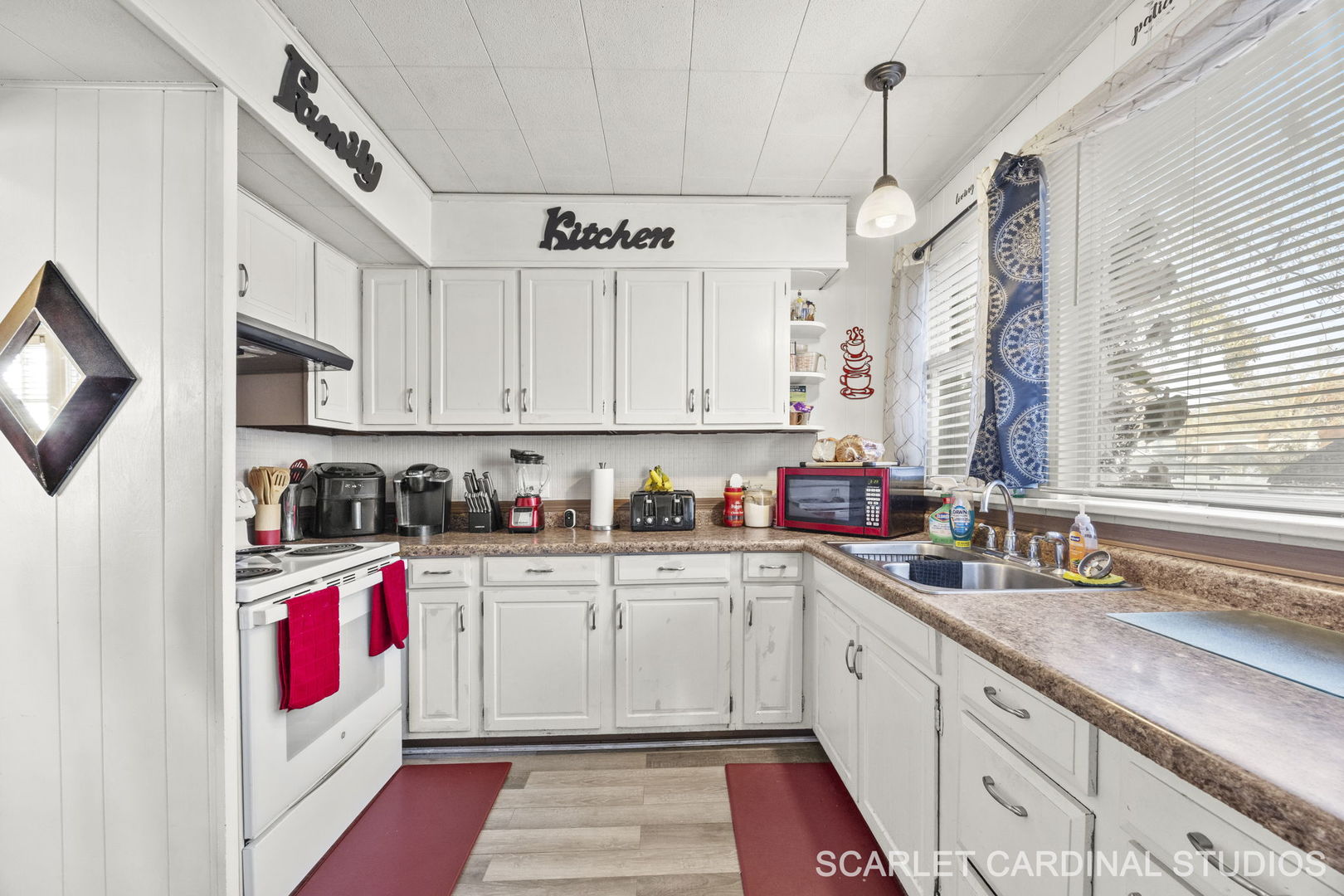 250 North Raynor Avenue Joliet, IL 60435 - Photo 8 of 17 a kitchen with stainless steel appliances granite countertop a sink and cabinets