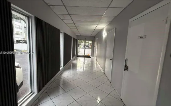 a view of gallery with windows